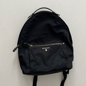 Michael Kors Backpack in good condition Kelsey large